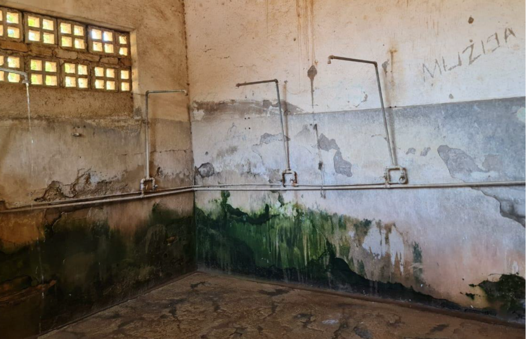 An aging shower block in Village 2